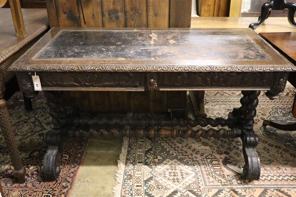 A Victorian carved oak library table, width 126cm, depth 66cm, height 74cm